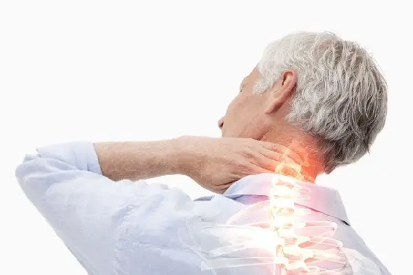 Man holding the back of his neck with the cervical spine highlighted, representing the neck pain concerns evaluated at Thomas Chiropractic in Stephenville, TX